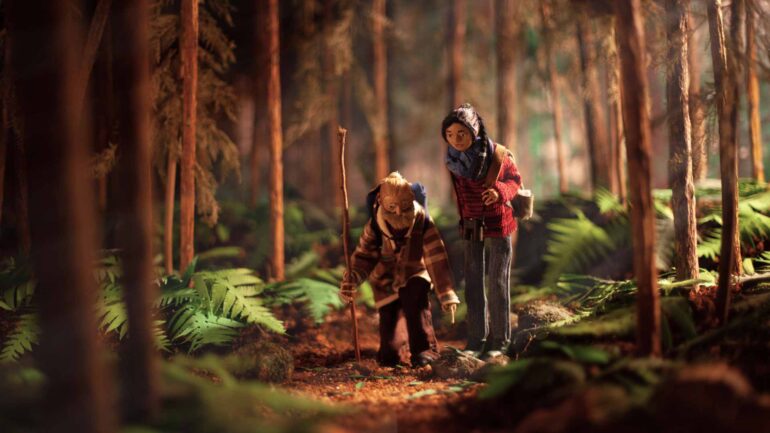 Old man and granddaughter in forest