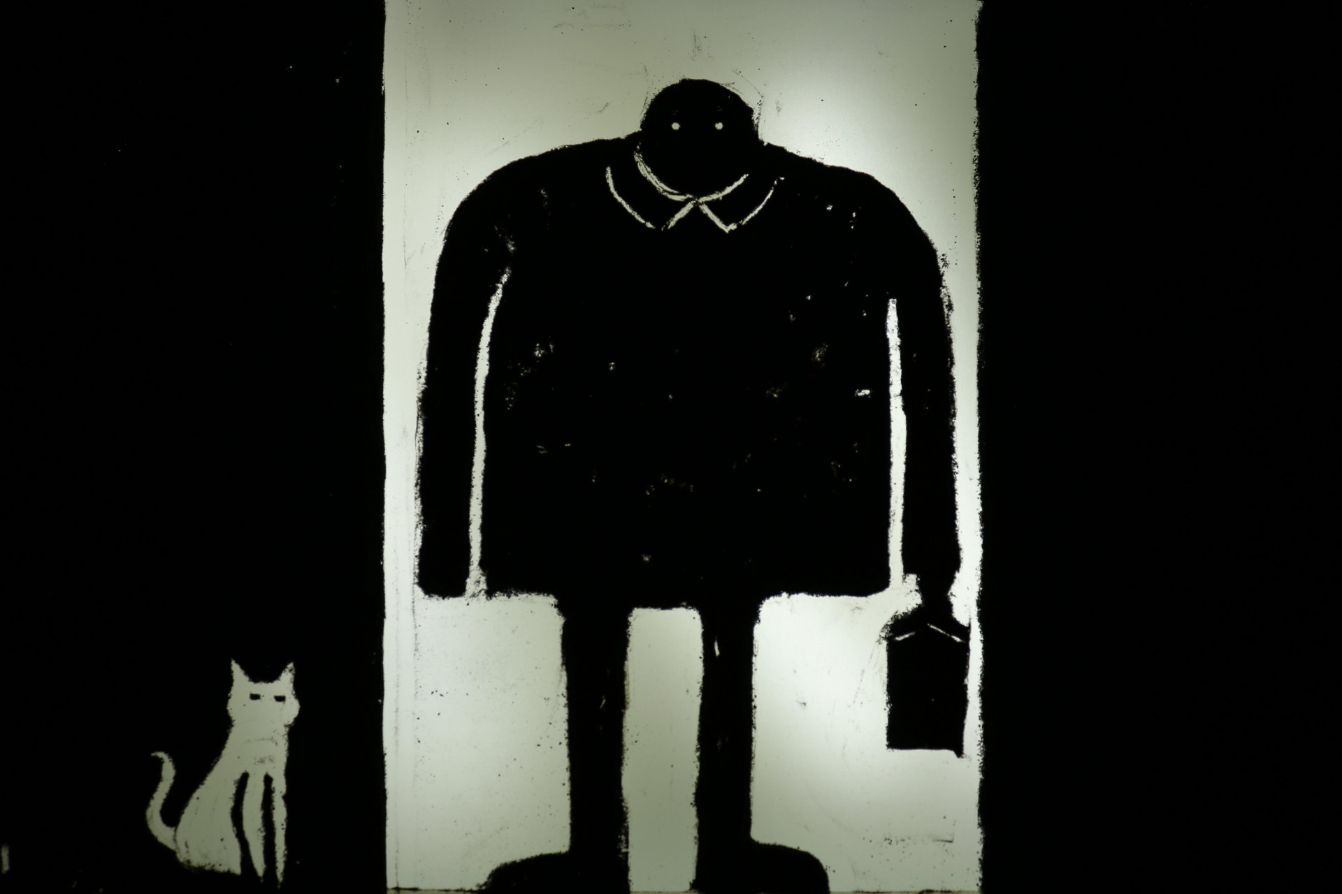 man and cat sand animation