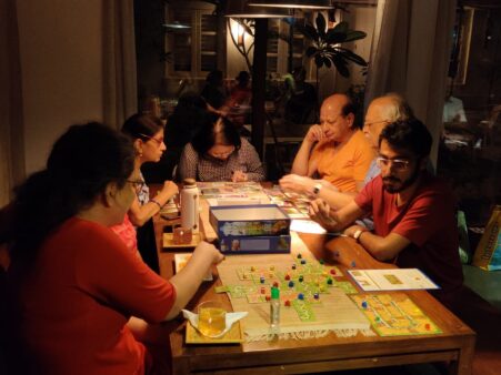 A lively evening with the game community in Ahmedabad during fortnightly Tuesday Game Nights. The table is shared by people from different age groups and it is always a delight