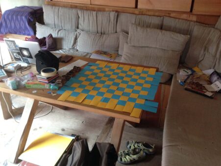 Chequered board in the making using paper strips during a 6 week volunteer project at Marpha Foundation, Nepal, 2016