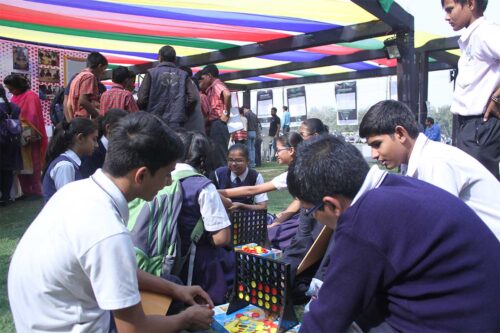 Students from a government school enjoying a game of connect-4 at the MAker fest, Ahmedabad 2017-2