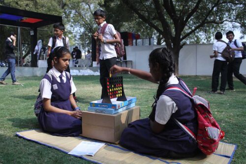 Students from a government school enjoying a game of connect-4 at the MAker fest, Ahmedabad 2017